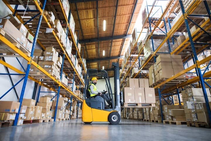 warehouse worker with forklift
